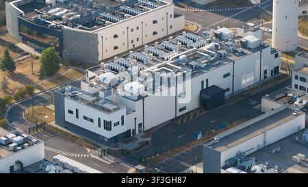 Aerial view of an AI data center, showing cloud computing, GPU infrastructure, high power demand and massive scale digital technology facilities. Stock Photo