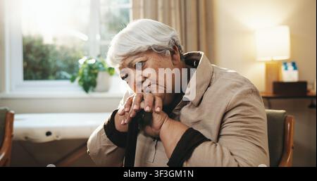 Alone, sad and walking stick of old woman with depression for grief, loss or pain as widow. Cane, retirement and thinking with senior person in Stock Photo