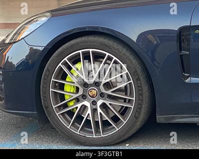 Cremona, Italy - June 2nd 2026 Detailed view of the front wheel and fender of a luxury German sedan, highlighting performance features and sleek desig Stock Photo
