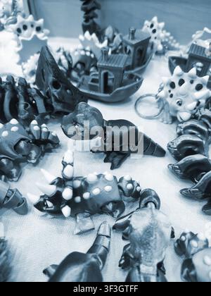 Art models printed on 3D printer. Different objects created on 3D printer from molten plastic. 3D printed different objects. Modern new modern additive progressive technologies. 3D printing technology Stock Photo