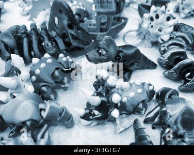 Art models printed on 3D printer. Different objects created on 3D printer from molten plastic. 3D printed different objects. Modern new modern additive progressive technologies. 3D printing technology Stock Photo