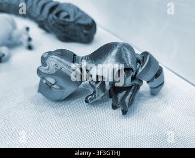 Art models printed on 3D printer. Different objects created on 3D printer from molten plastic. 3D printed different objects. Modern new modern additive progressive technologies. 3D printing technology Stock Photo