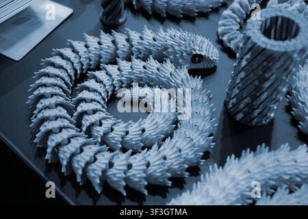 Art models printed on 3D printer. Different objects created on 3D printer from molten plastic. 3D printed different objects. Modern new modern additive progressive technologies. 3D printing technology Stock Photo