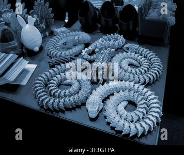 Art models printed on 3D printer. Different objects created on 3D printer from molten plastic. 3D printed different objects. Modern new modern additive progressive technologies. 3D printing technology Stock Photo