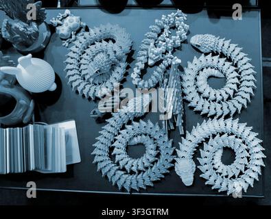Art models printed on 3D printer. Different objects created on 3D printer from molten plastic. 3D printed different objects. Modern new modern additive progressive technologies. 3D printing technology Stock Photo