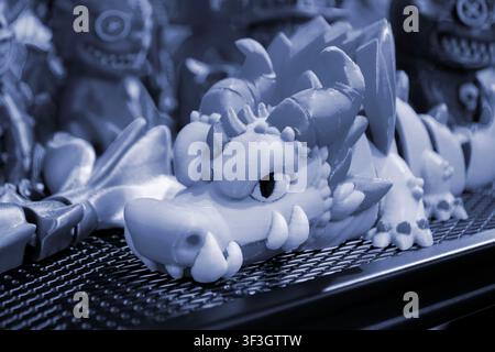 Art models printed on 3D printer. Different objects created on 3D printer from molten plastic. 3D printed different objects. Modern new modern additive progressive technologies. 3D printing technology Stock Photo
