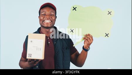 Delivery man, portrait or box in studio with speech bubble, about us or review on social media. Black person, parcel or word cloud on blue background Stock Photo