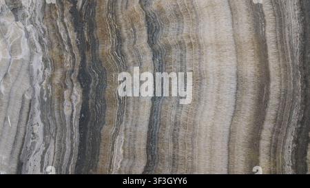 High-resolution brown marble surface featuring elegant natural veins and rich earthy tones. Ideal for backgrounds, interior design concepts Stock Photo