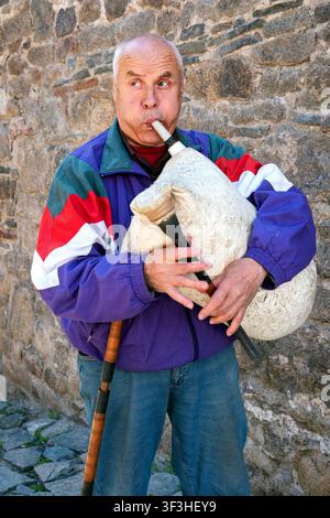 Bulgarian folk musician playing a gaida bagpipe, Old town, Plovdiv, Bulgaria, The Balkans, Eastern Europe Stock Photo