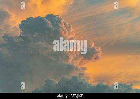 Glowing storm clouds at sunset over Tam Giang Lagoon, Hue, Vietnam Stock Photo