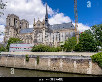 Looking acroos the River Seine at the rebuilt spire and roof of Notre-Dame de Paris Cathedral after the devastating fire in 2019 in Paris ,France Stock Photo
