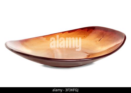 Brown ceramic empty large dish isolated on white background Stock Photo