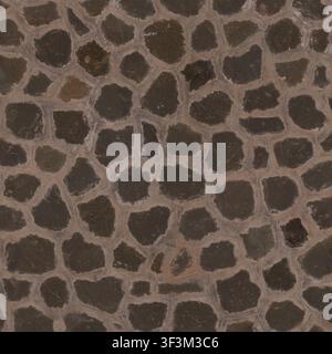 A high-detail background of a dark brown stone cladding wall with rounded stones set in mortar. Stock Photo