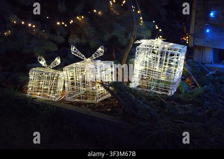 A set of three LED gift boxes of different sizes that create festive lighting. High quality photo Stock Photo