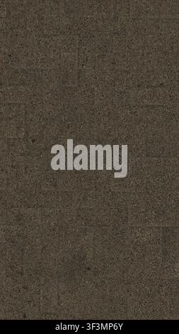A close-up view of dark grey pebble paving tiles arranged in a structured pattern, suitable for a seamless ground texture. Stock Photo
