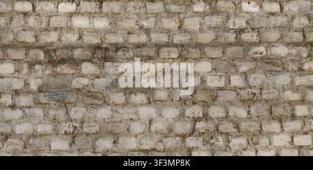 A close-up of a weathered white brick wall with visible aging and grey mortar lines. Stock Photo