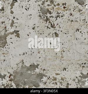 A close-up of a white plaster wall with severe cracking and exposed underlying grey material. Stock Photo