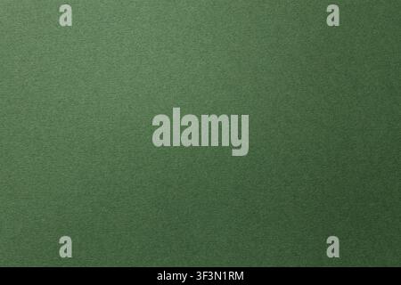 Textured dark green paper background with copy space for design projects Stock Photo