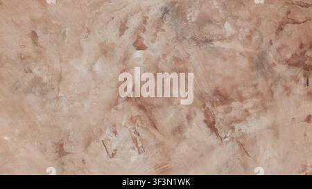Beige brown weathered concrete wall background with brushstroke texture and distressed painted surface Stock Photo