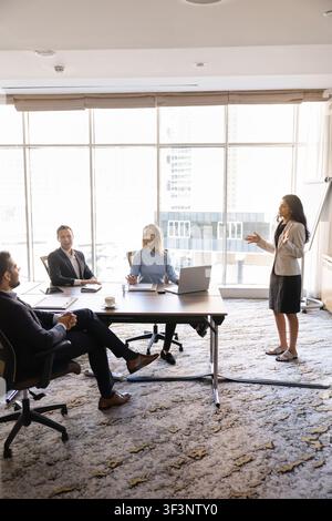 Multiethnic corporate team participate in group meeting or training Stock Photo