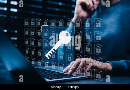 Encryption key security concept. Person using laptop and locked database. secure access control, password protection, data privacy, cybersecurity, Stock Photo