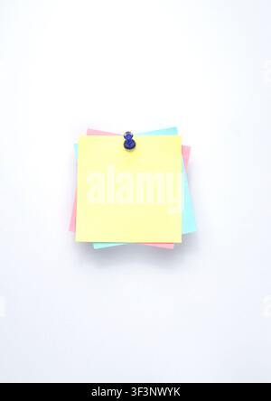 Pastel Sticky Notes Pinned on White Background with Copy Space Stock Photo