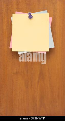 Colorful Sticky Notes Pinned on Wooden Board for Planning Concept Stock Photo