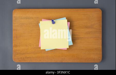 Colorful Sticky Notes on Wooden Board for Planning Concept Stock Photo