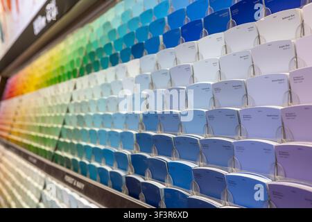 Sioux Falls, South Dakota, USA - 3.10.2024: Selection of paint sample swatches on display in a Lowes store for customers to choose from Stock Photo