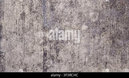 Aged concrete wall texture featuring dark weathered stains, fine scratches, and a grungy industrial vintage look. High Quality Photo Stock Photo