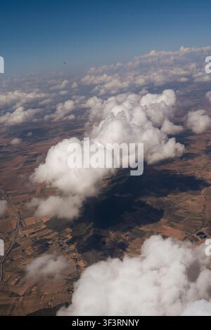 Scattered White Fluffy Clouds Across a Blue Sky in Daylight Stock Photo ...