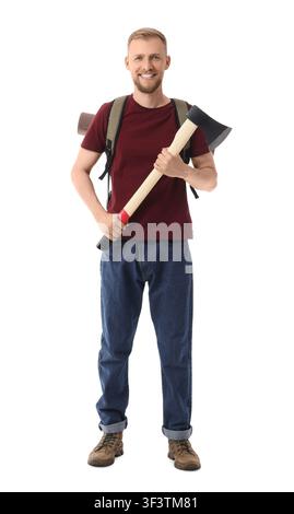 Smiling young man with backpack and axe, ready for camping or outdoor adventure, isolated on white background Stock Photo