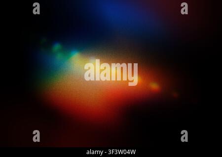 Abstract light refraction creating vibrant spectrum of colors and lens flares on dark background Stock Photo