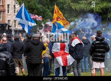 Glasgow, UK. 25th July, 2026. UK Stand Up To Racism counter protest to the Unite The Clan's Anti Migrant rally with angry exchanges and police intervention. Credit: Trash/Alamy Live News Stock Photo