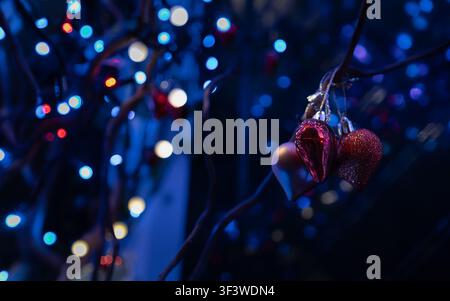 Creative close-up of decorative event lighting with vibrant blue and multicolored bokeh effect for festive atmosphere Stock Photo