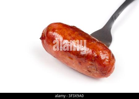 Fried homemade sausage. Fresh sausage on a white background. Meat delicacy. Stock Photo