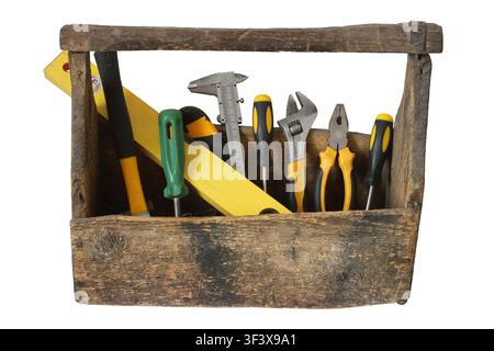An old wooden toolbox isolated on a white background. Tools for repairing in a wooden box. Stock Photo