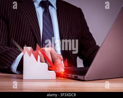Business professional analyzing cybersecurity risk on laptop. Threat detection, attack prevention, data protection, digital security, risk management, Stock Photo