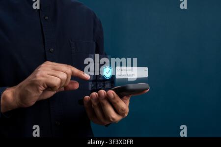 User entering OTP verification code on smartphone with shield icon. Two-factor authentication, identity verification, cybersecurity, data protection, Stock Photo