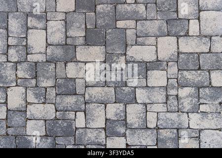 Background from paving stone in black and gray color difference -, used for backdrop, background Stock Photo