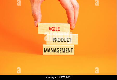 Agile product management words symbol. Concept words Agile product management on beautiful wooden blocks. Beautiful orange background. Business agile Stock Photo