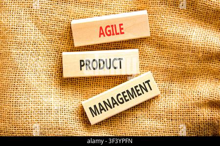 Agile product management words symbol. Concept words Agile product management on beautiful wooden blocks. Beautiful canvas background. Business agile Stock Photo