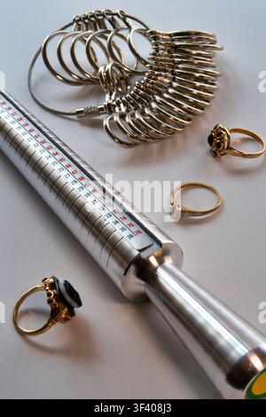 Vintage jewelry and ring sizers still life, 2026, USA Stock Photo