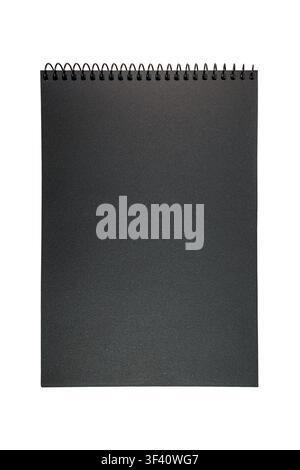 Closed spiral bound notebook with textured cover, blank sketchpad surface Stock Photo
