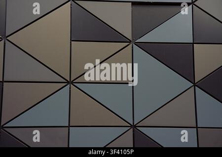 A modern abstract composition featuring metallic triangles and squares, architectural and interior design projects, providing a clean and contemporary Stock Photo