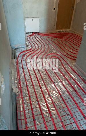 Underfloor surface heating pipes. Low temperature heating concept Stock Photo