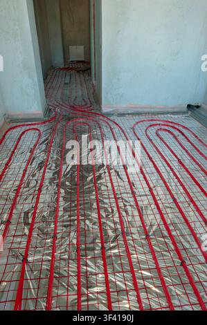 Underfloor surface heating pipes. Low temperature heating concept Stock Photo
