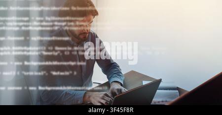 Focused Man Working On Laptop In Office, Modern Workspace, Unrecognizable Stock Photo