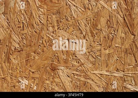 Pressed OSB oriented strand board wooden texture background surface Stock Photo