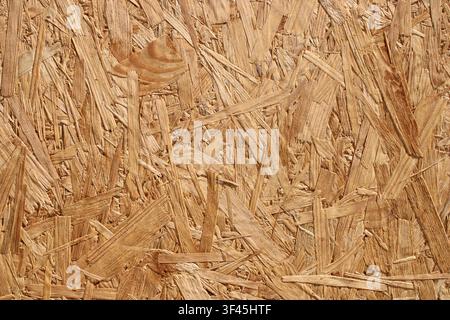 Pressed OSB oriented strand board wooden texture background surface Stock Photo